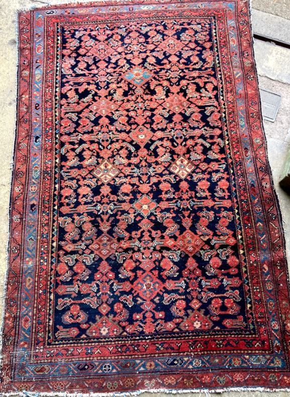 A Kurdish blue ground rug, 190 x 120cm